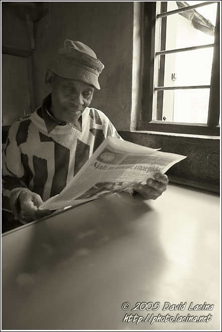 Reading Newspapers - Colorized Tanzania, Tanzania