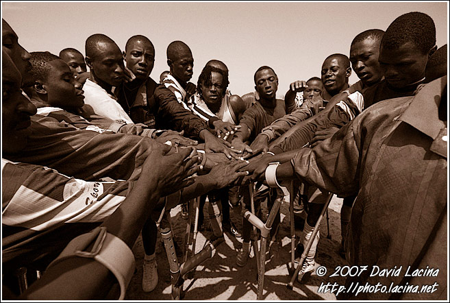 Amputee Football Team Praying - Amputee Football Team, Sierra Leone
