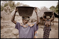 Women Bringing Water To The Village Of Ethiouwar, Bedick Tribe, Senegal
