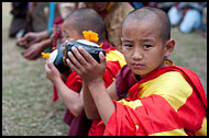 Monk Watching Cham Dance, Cham Dance, India