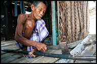 Cutting Wood, Sea gypsies - Bajau Laut, Malaysia