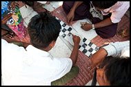 Men Playing Game, Mandalay, Myanmar (Burma)