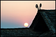 Sunset And Traditional House, Xishuangbanna, China